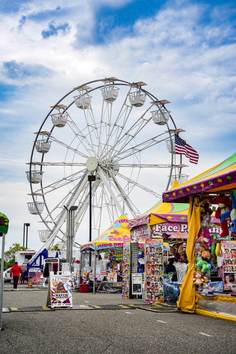 Dreamland Amusements Ferris wheel and colorful midway games